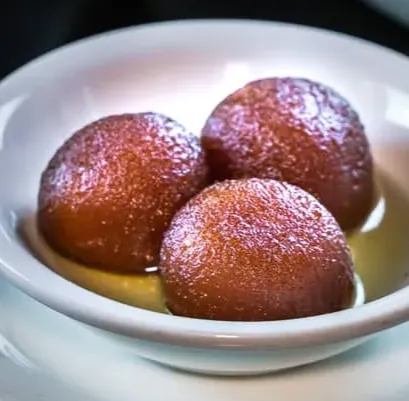 Fluffy golden pancakes served at Sunrise Pizza and Breakfast Diner Edmonton